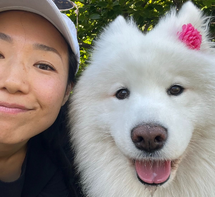 dog sitter and a samoyed doing a selfie